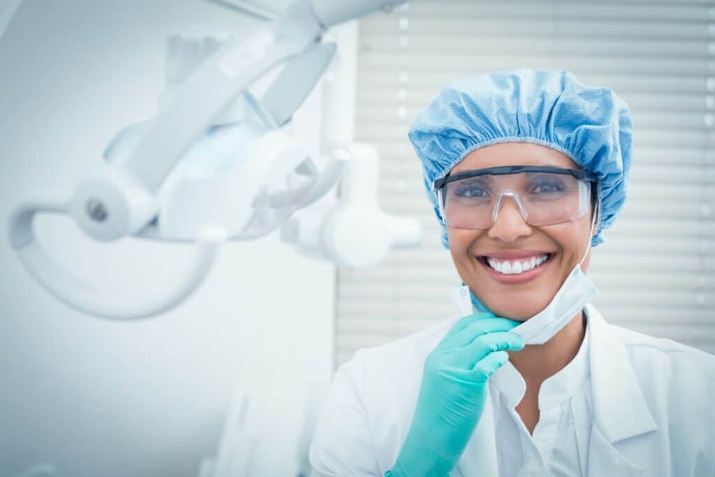 A smiling dentist at a dental practice